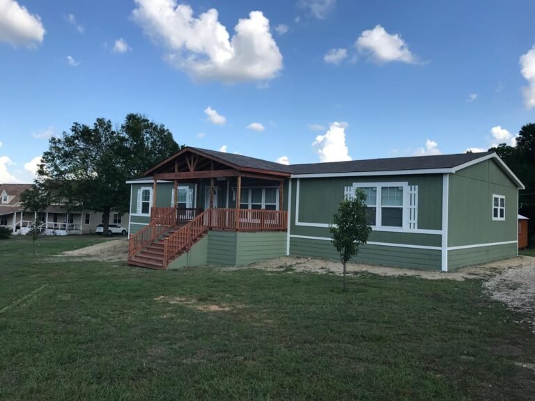 Covered porch with cedar-toned railing